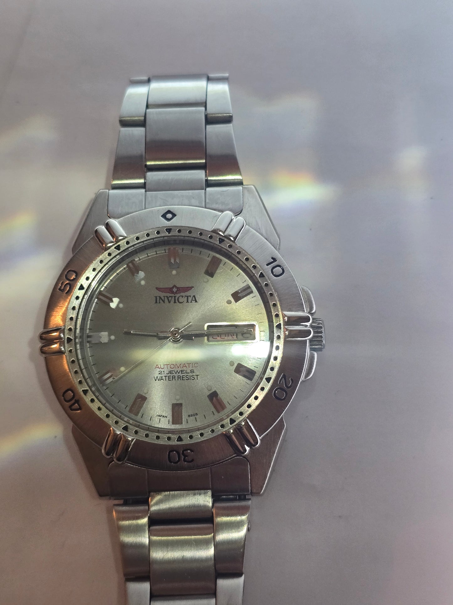 Vintage Invicta automatic day-date 21 jewels, see thru the back men's watch
