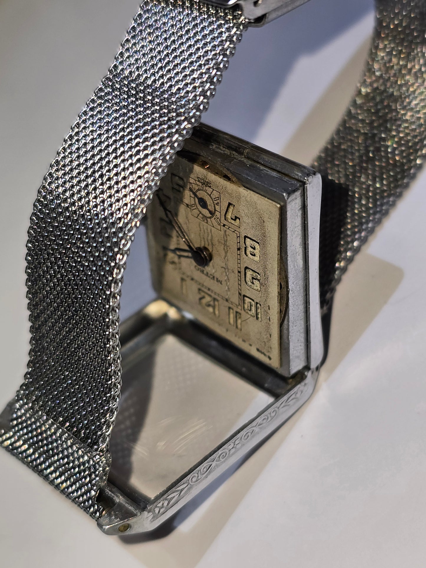 Vintage art deco Metro square hooded engraved case wristwatch. 1930's