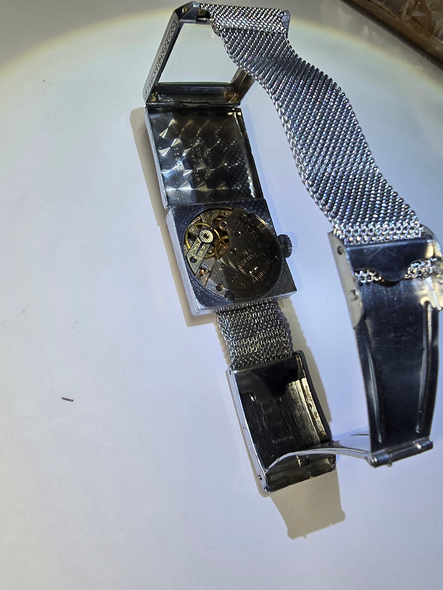 Vintage art deco Metro square hooded engraved case wristwatch. 1930's