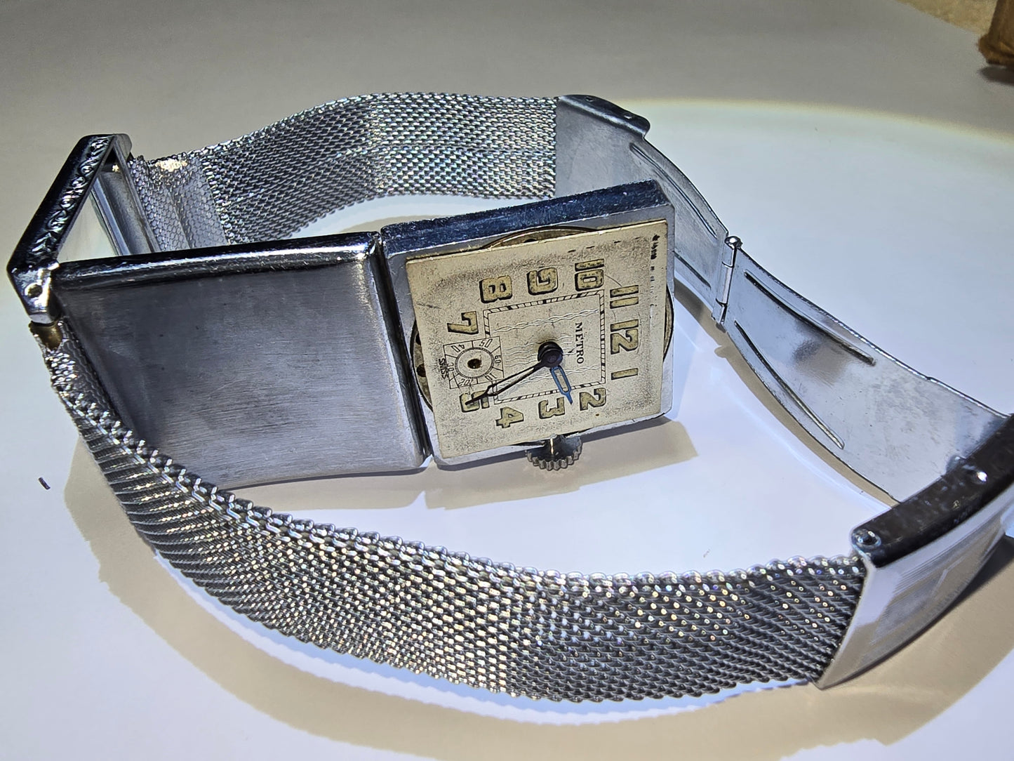 Vintage art deco Metro square hooded engraved case wristwatch. 1930's