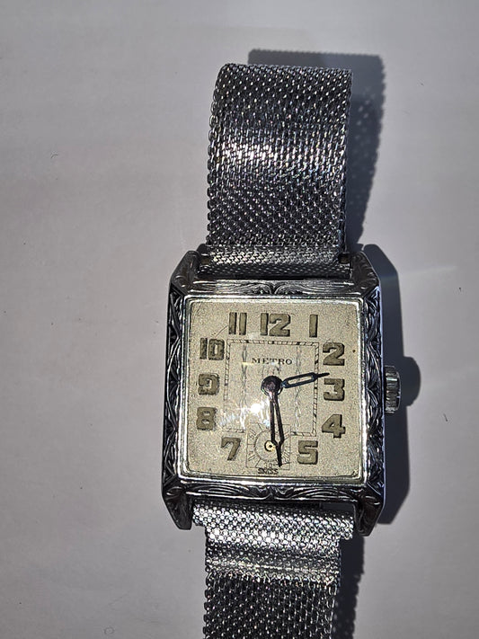 Vintage art deco Metro square hooded engraved case wristwatch. 1930's