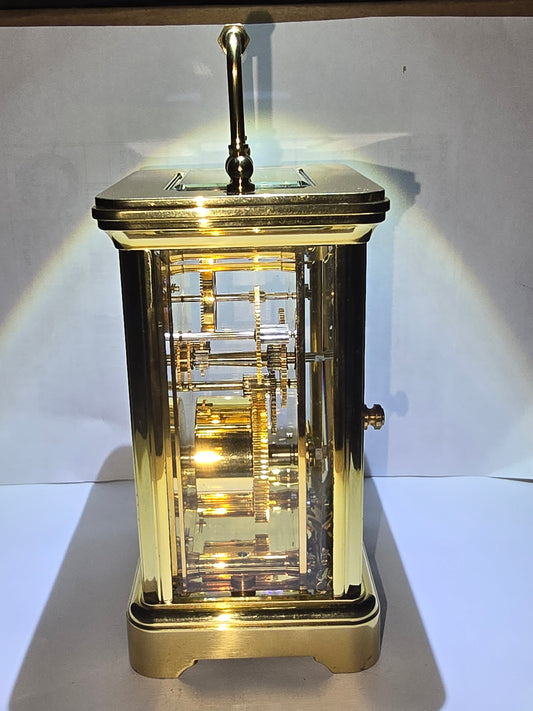 Asprey and Garrard brass cased carriage clock