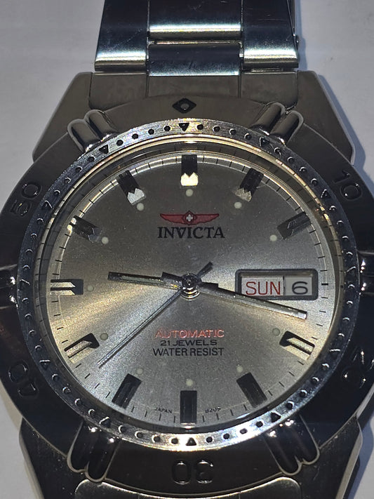 Vintage Invicta automatic day-date 21 jewels, see thru the back men's watch