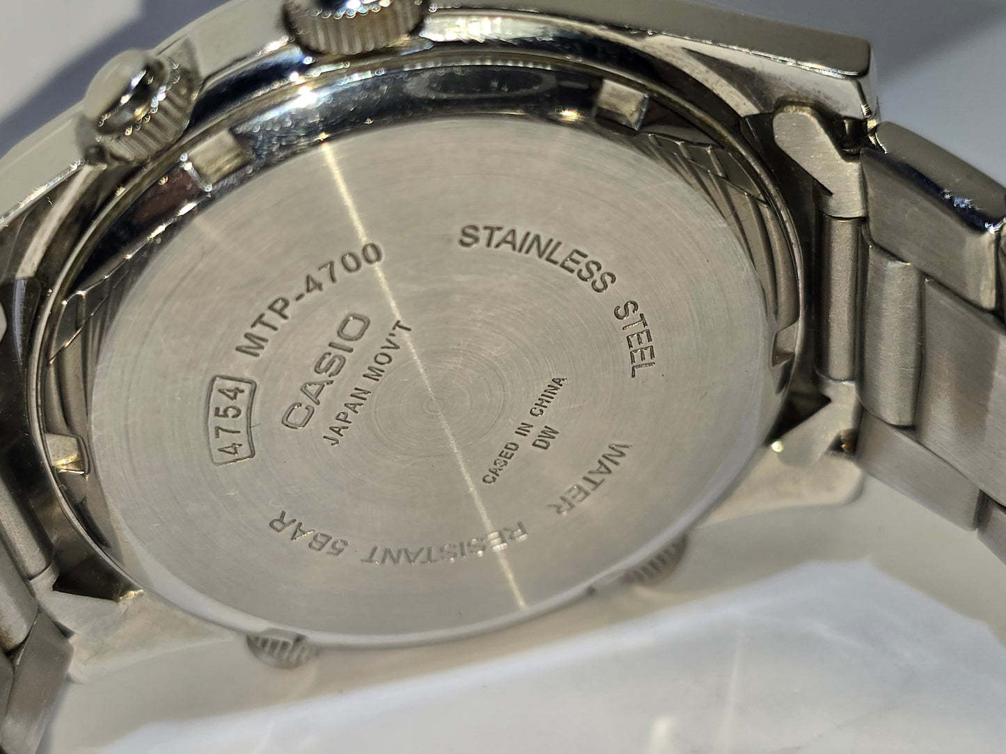 Vintage Casio MTP4700 world time, chronograph, analog, rotating bezel, digital watch