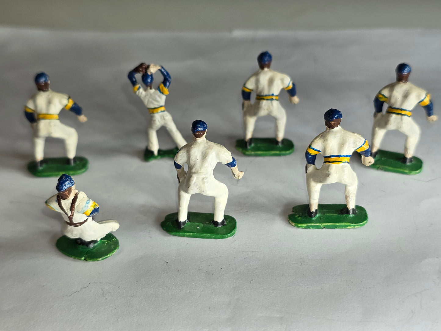 Vintage rare set of 7 cast iron miniature baseball players