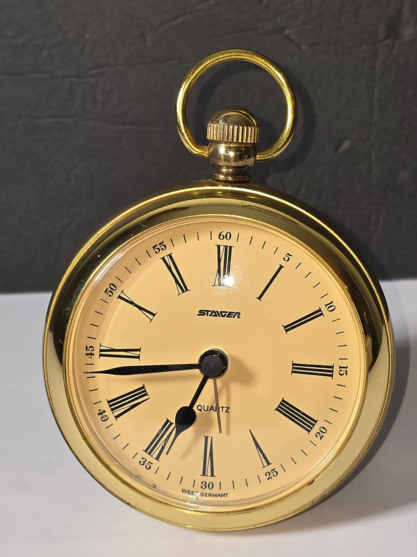 Vintage Staiger quartz table clock styled as a pocket watch