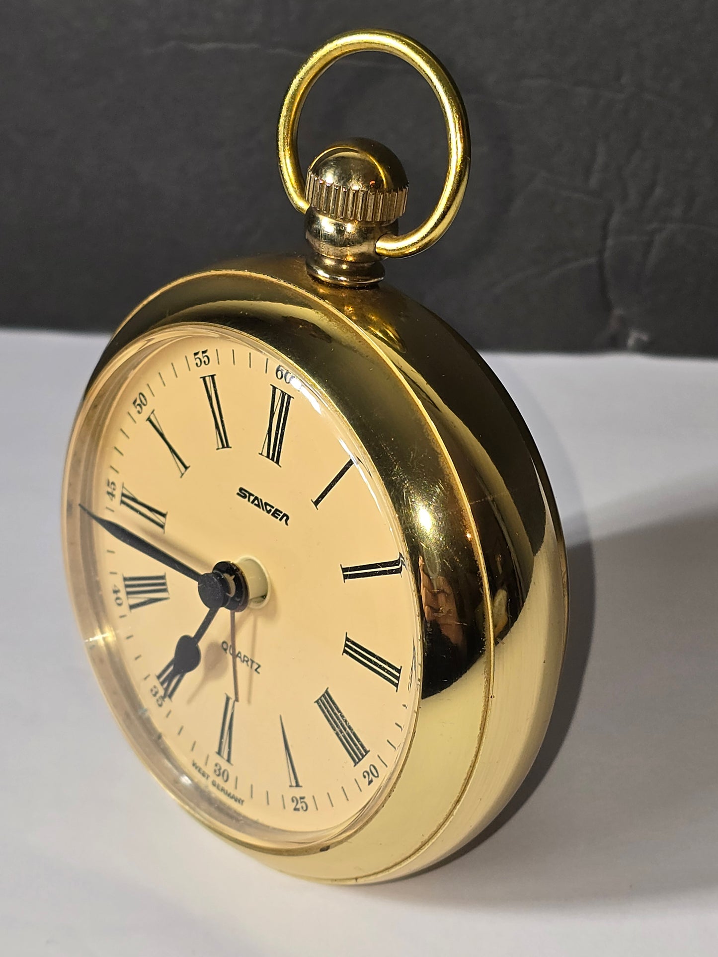 Vintage Staiger quartz table clock styled as a pocket watch