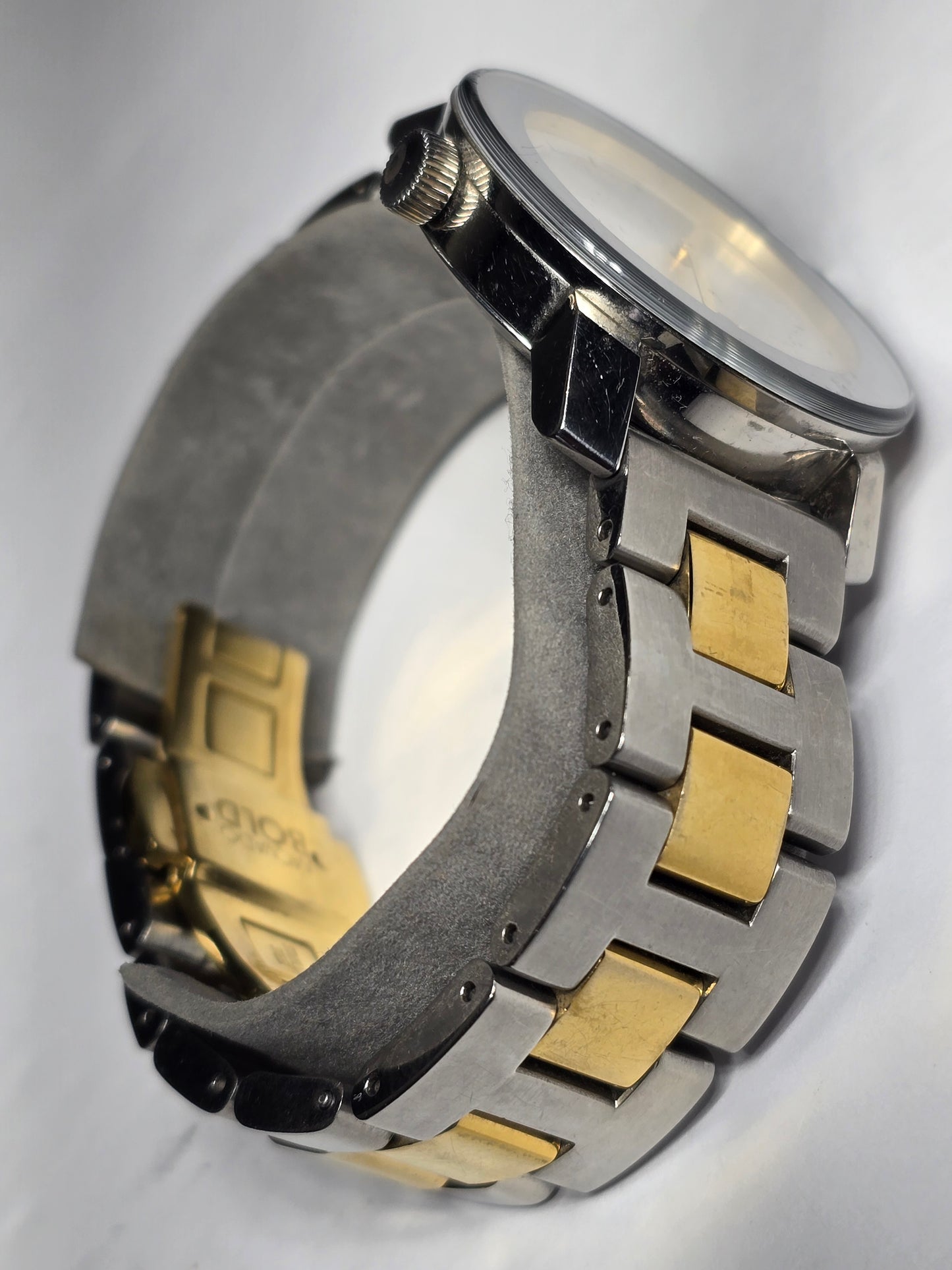 Movado two-tone stainless-steel unisex watch with a silver sunray dial