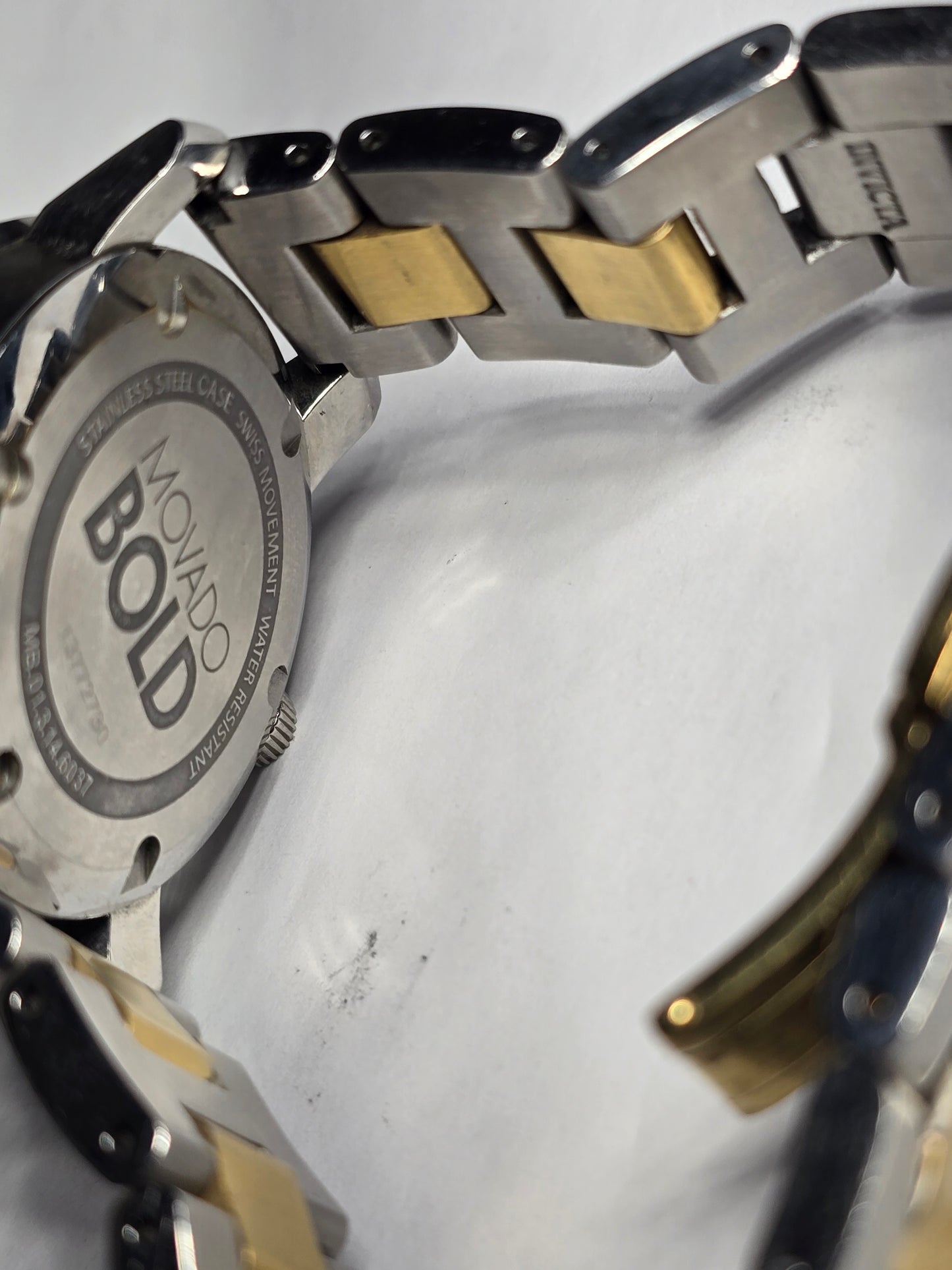 Movado two-tone stainless-steel unisex watch with a silver sunray dial