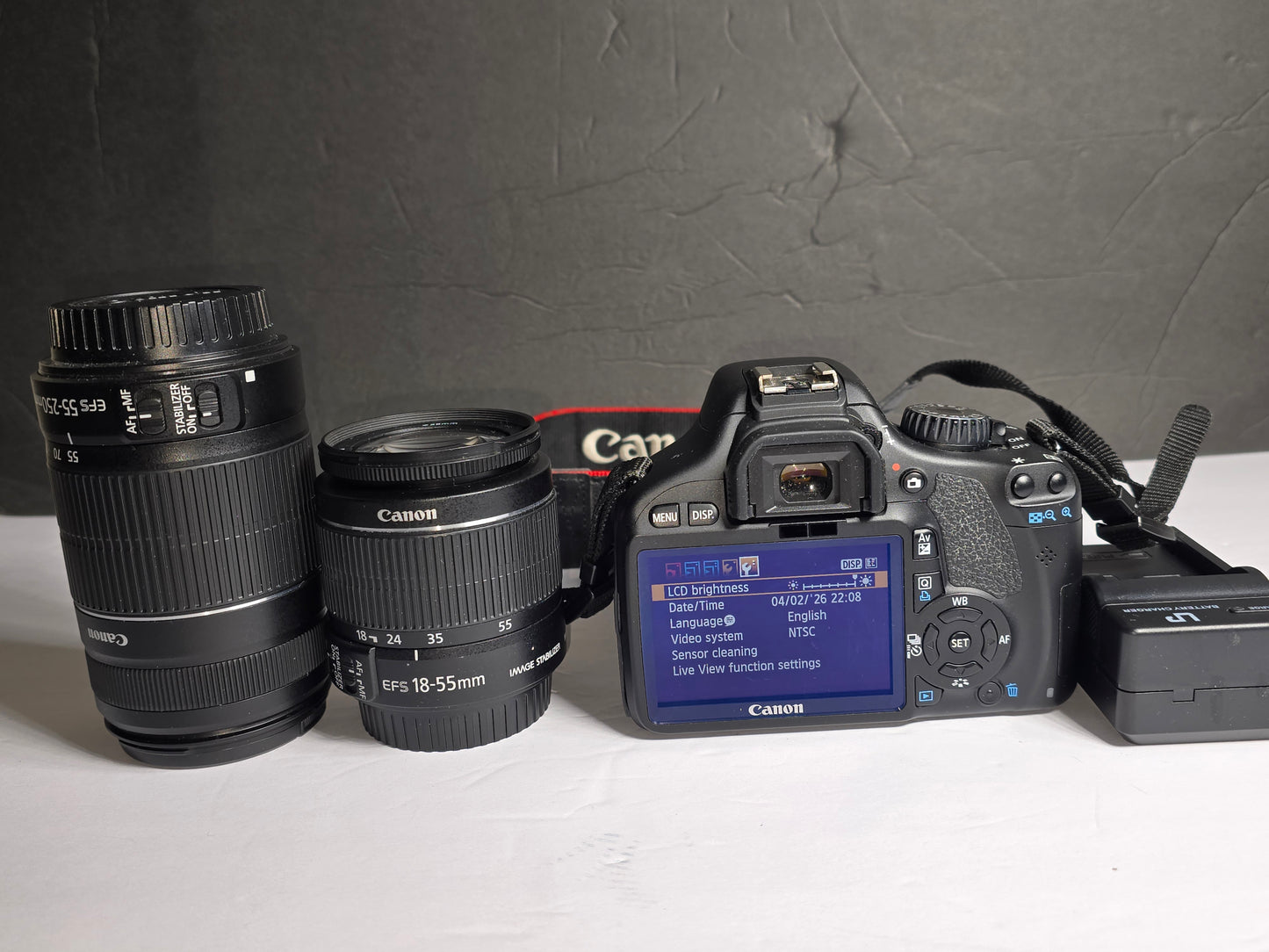 Canon EOS Rebel T2i DSLR Camera kit with 2 extra lenses and shoulder bag