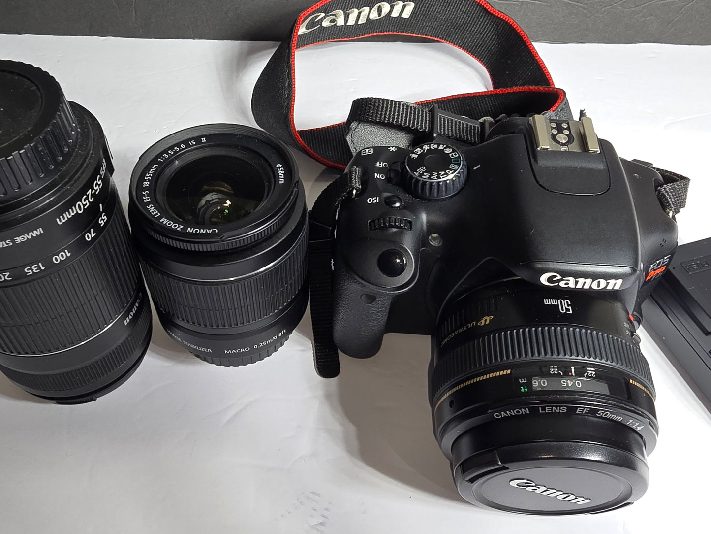 Canon EOS Rebel T2i DSLR Camera kit with 2 extra lenses and shoulder bag