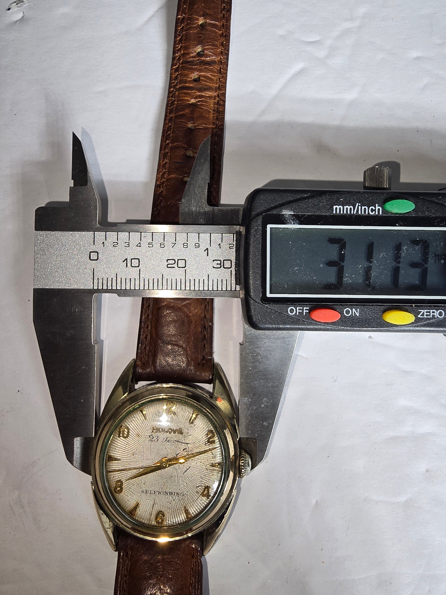 Vintage Bulova 23 automatic 14k capped bezel