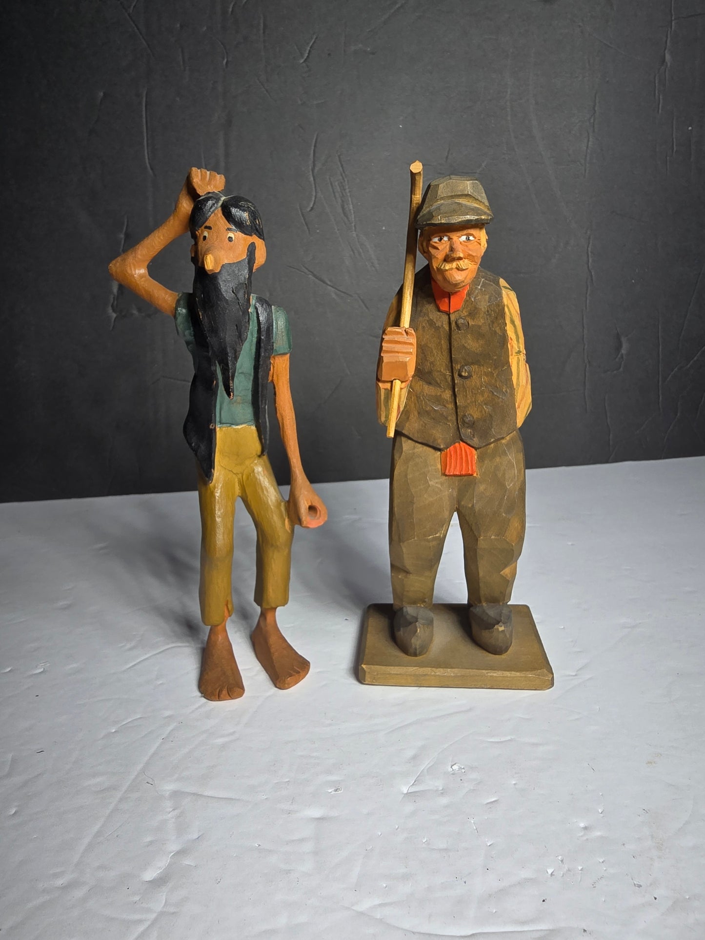 Two vintage wood carved figurines