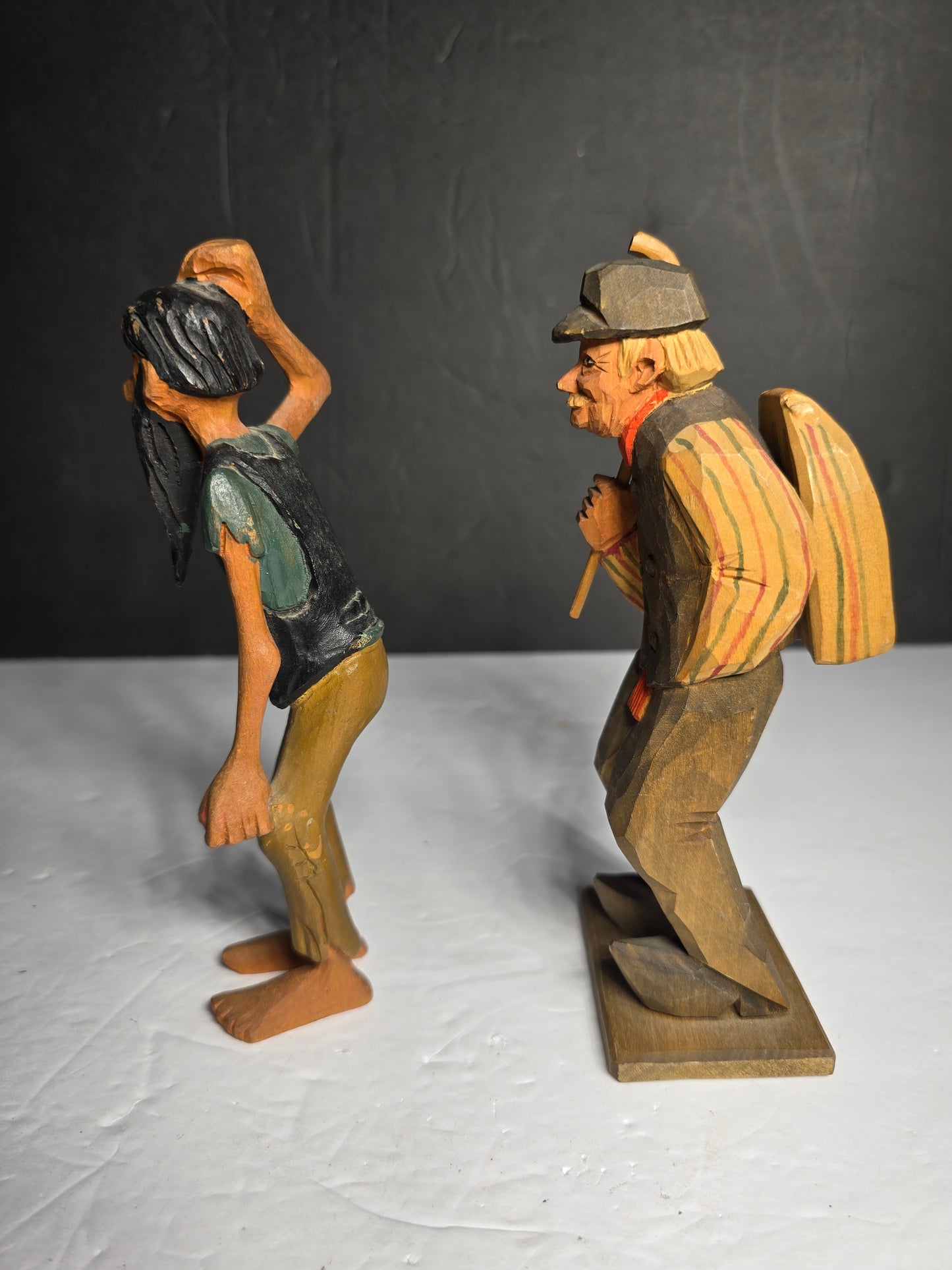 Two vintage wood carved figurines