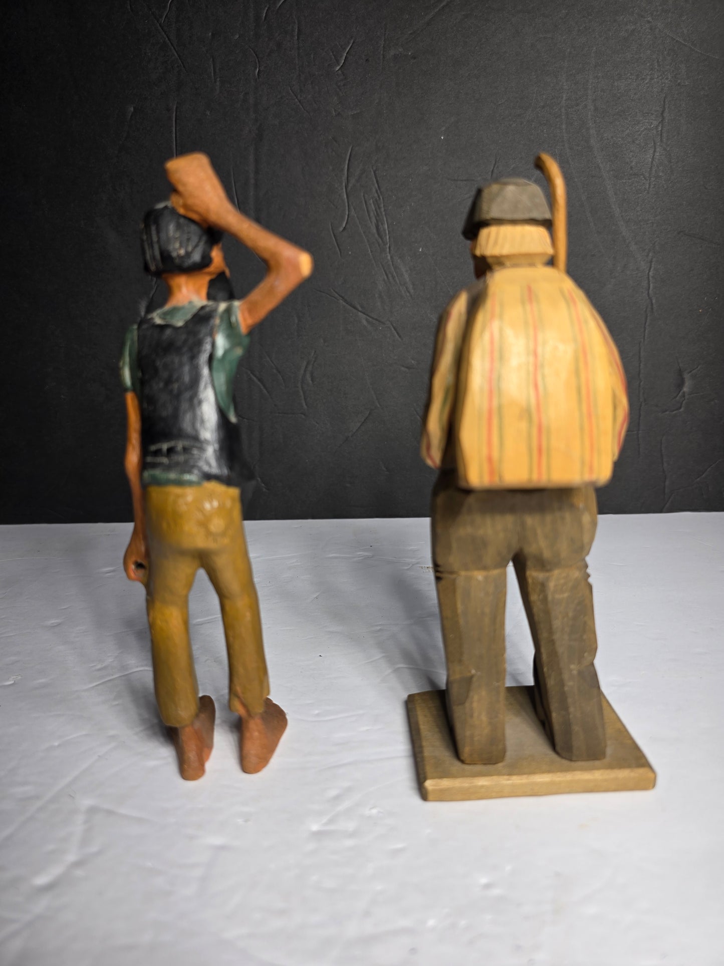 Two vintage wood carved figurines