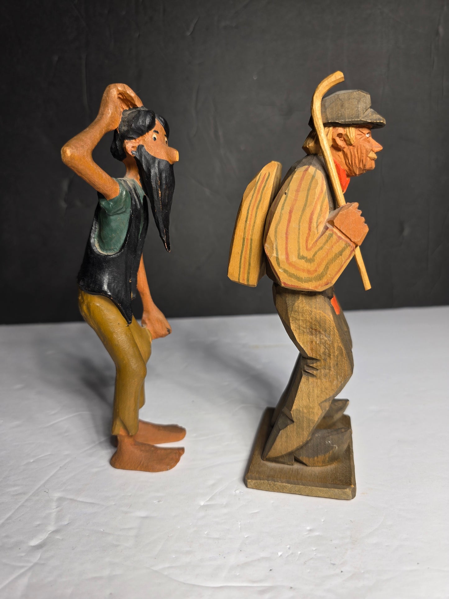 Two vintage wood carved figurines