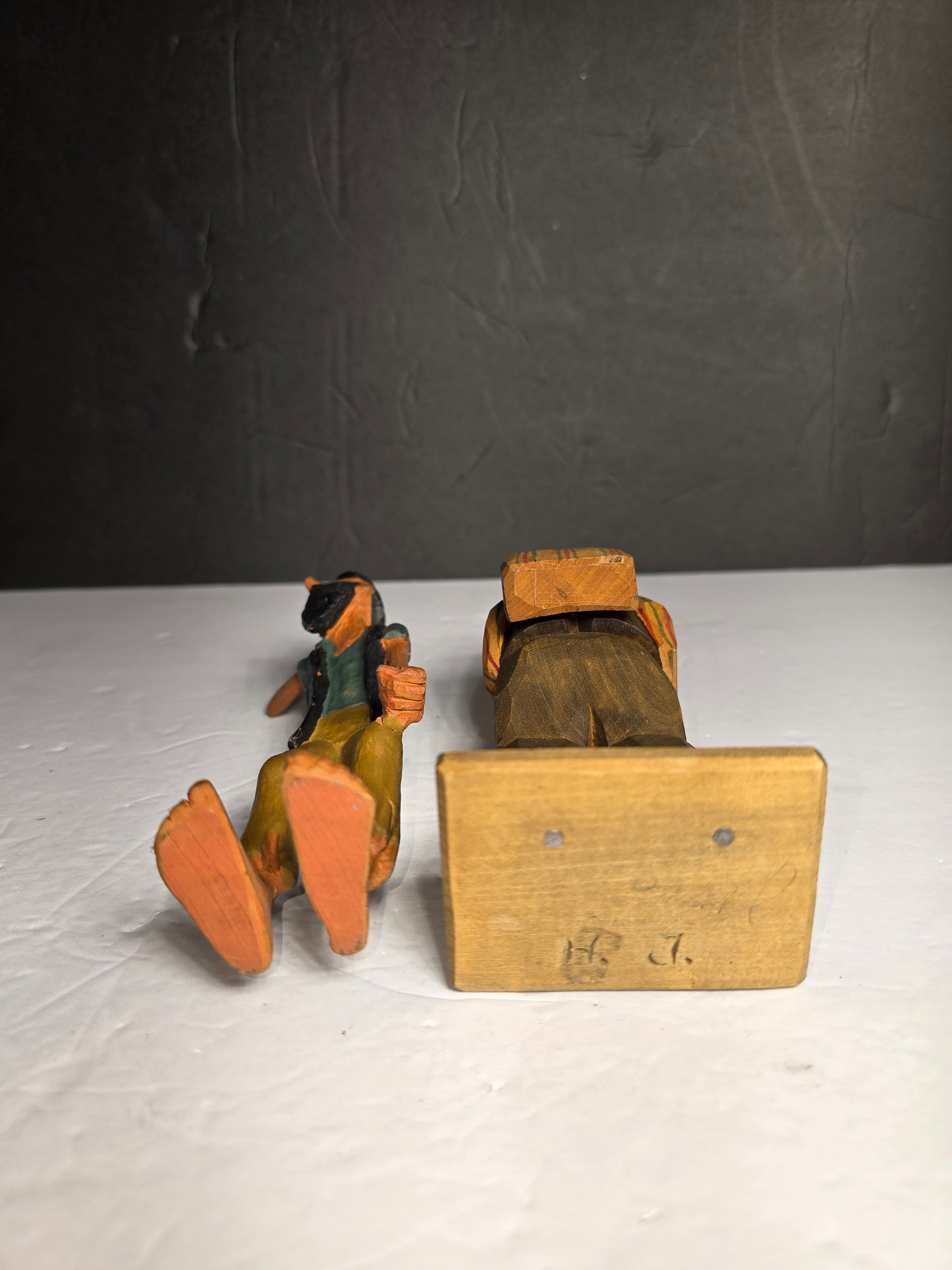 Two vintage wood carved figurines