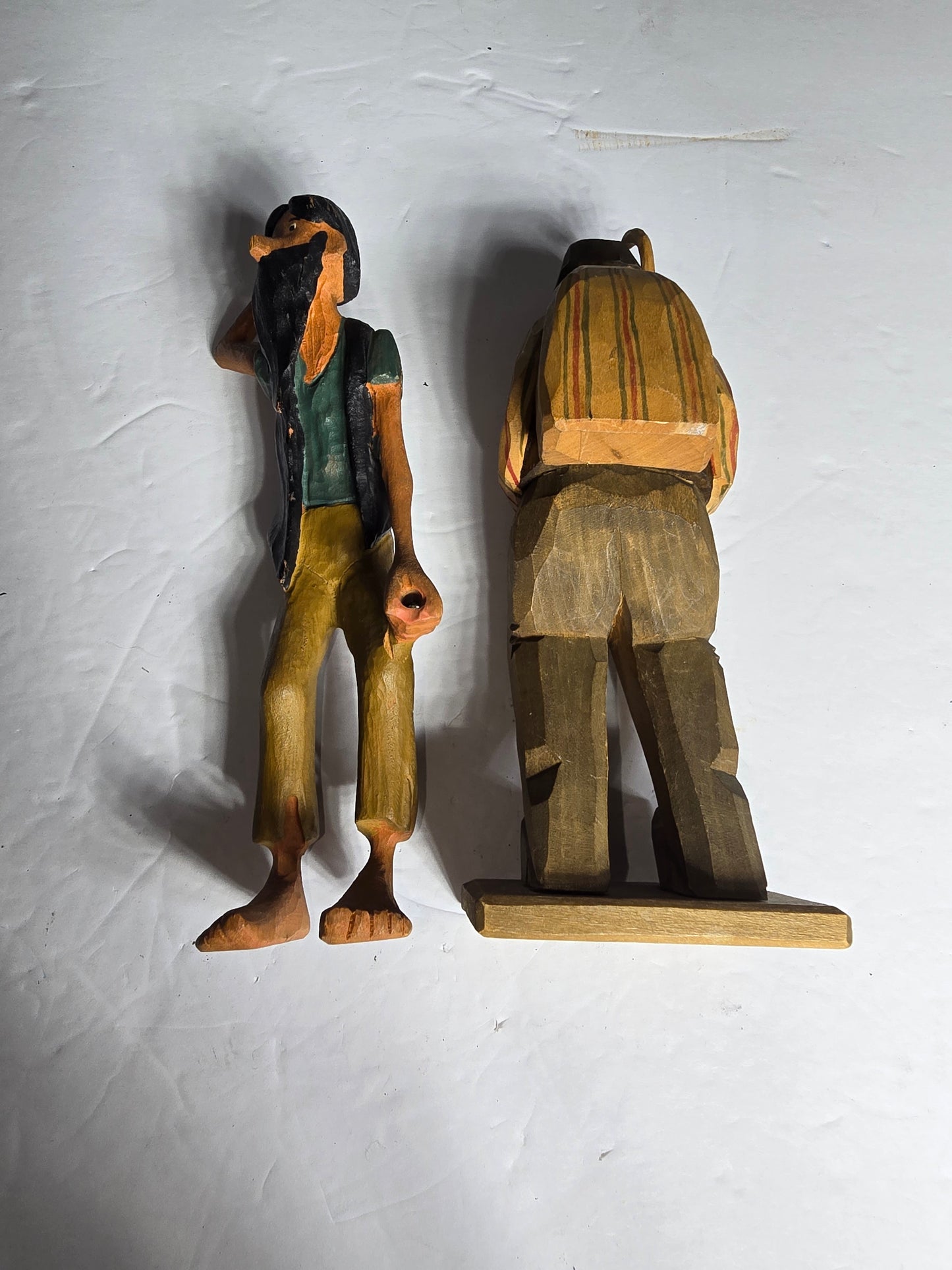 Two vintage wood carved figurines