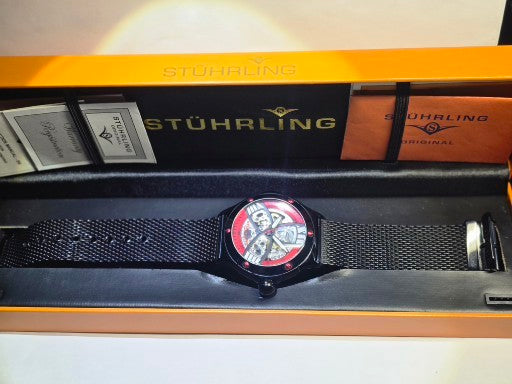 Scarce Stuhrling alpine slalom skeleton automatic men's watch original case and papers