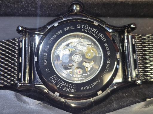 Scarce Stuhrling alpine slalom skeleton automatic men's watch original case and papers