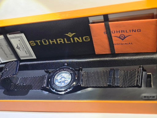 Scarce Stuhrling alpine slalom skeleton automatic men's watch original case and papers