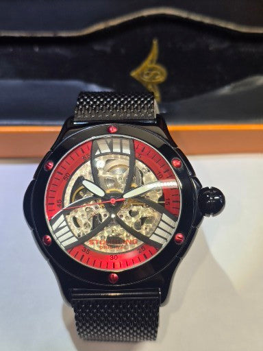 Scarce Stuhrling alpine slalom skeleton automatic men's watch original case and papers